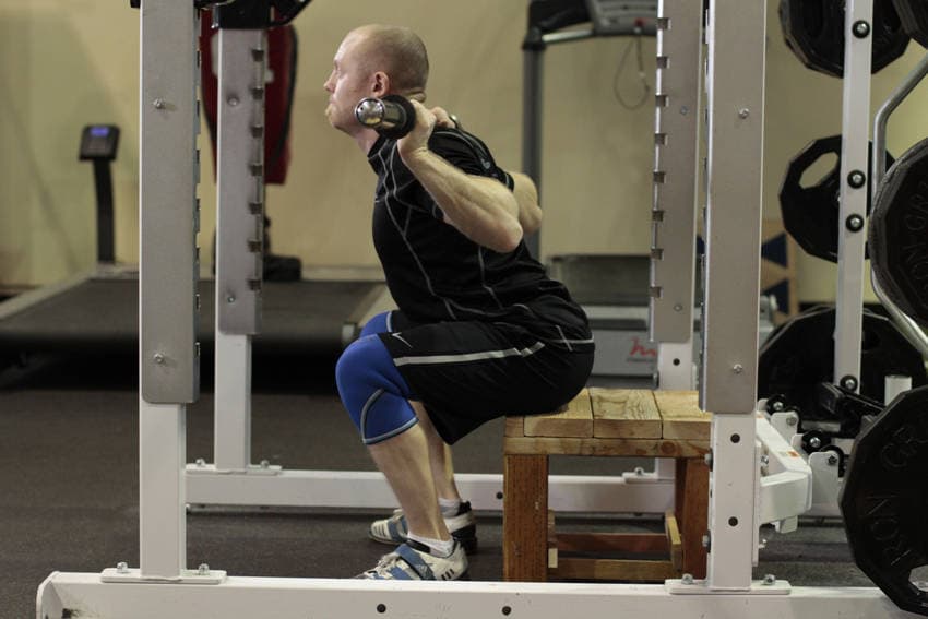 Démonstration de l’exercice : Squat sur box