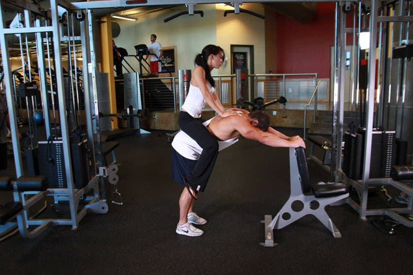 Démonstration de l’exercice : Extensions mollets à la machine (donkey calf raise)