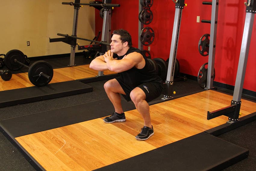 Démonstration de l’exercice : Squat sauté à poids de corps