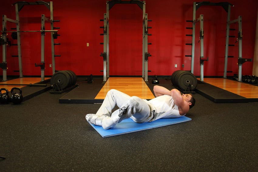 Démonstration de l’exercice : Sit-up grenouille