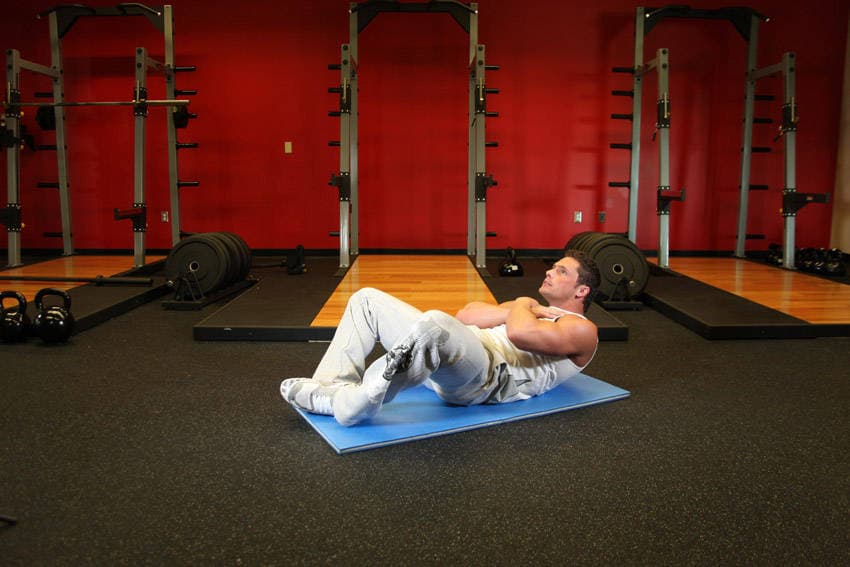 Démonstration de l’exercice : Sit-up grenouille