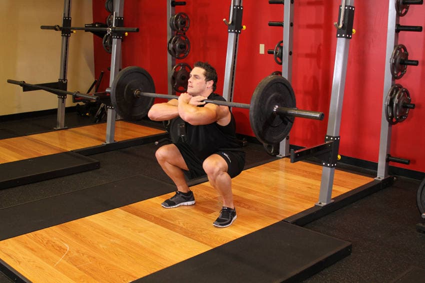 Démonstration de l’exercice : Squat avant à la barre