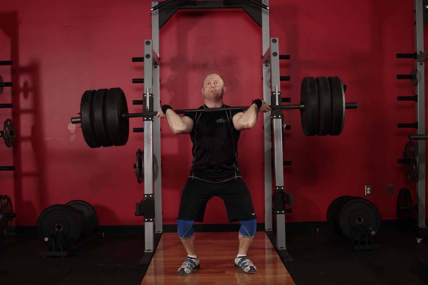 Démonstration de l’exercice : Squat de flexion du jerk