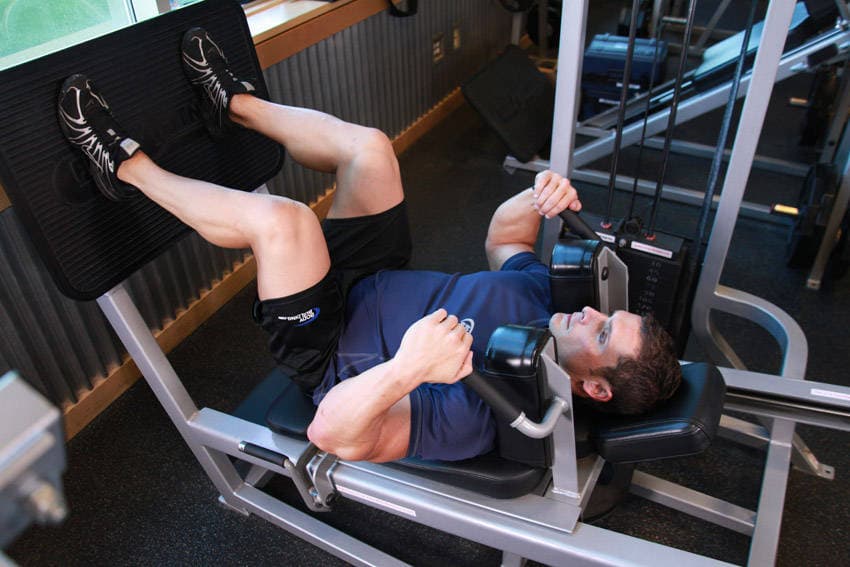 Démonstration de l’exercice : Squat à la machine, allongé