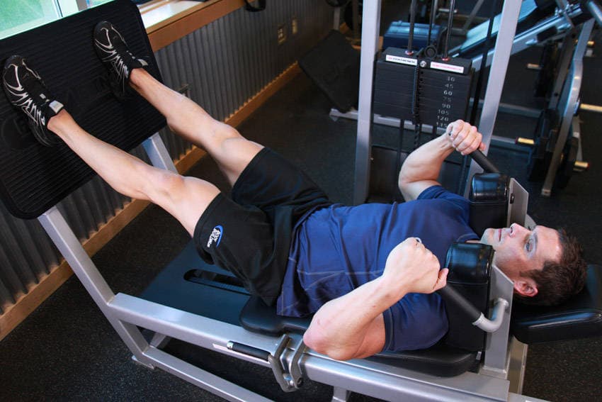 Démonstration de l’exercice : Squat à la machine, allongé