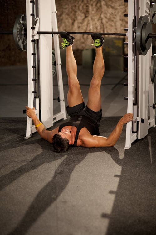 Démonstration de l’exercice : Presse à jambes au Smith machine