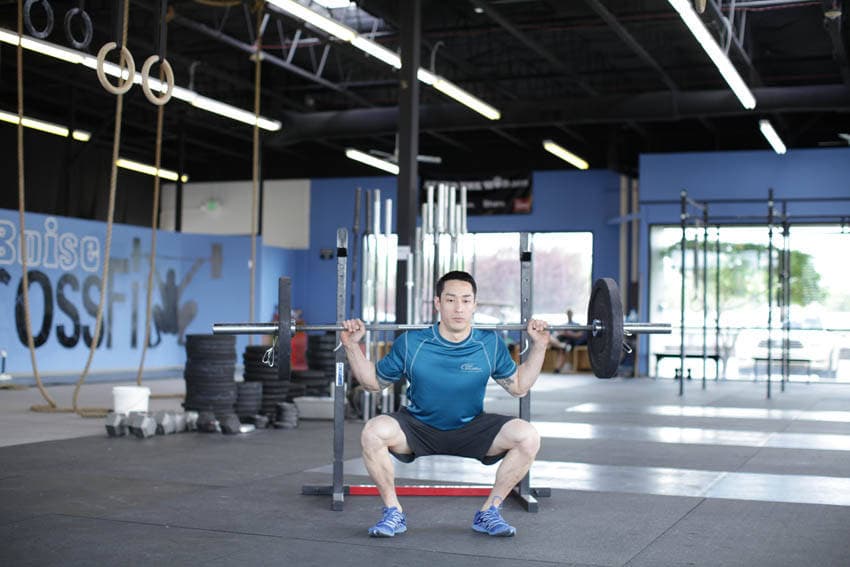 Démonstration de l’exercice : Squat sauté lesté