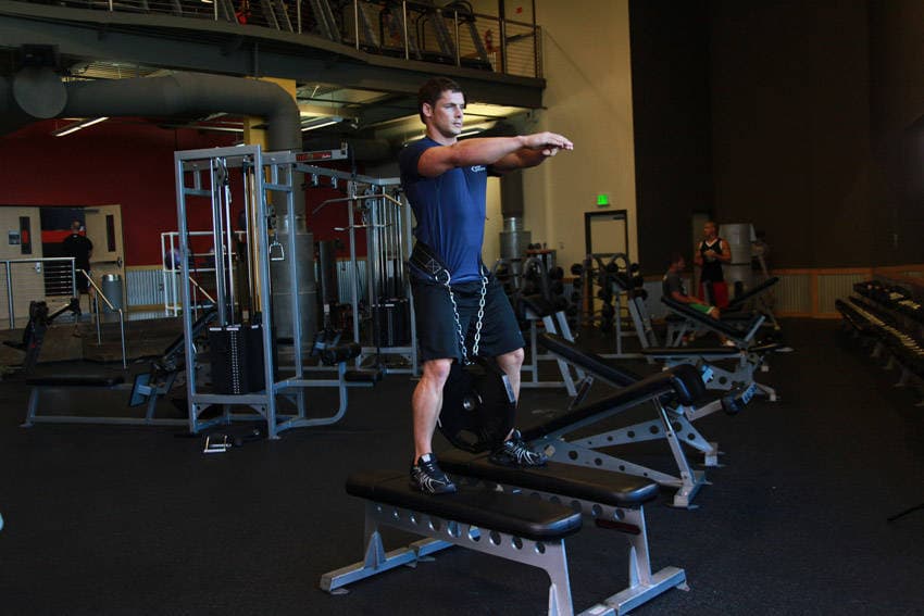 Démonstration de l’exercice : Squat lesté