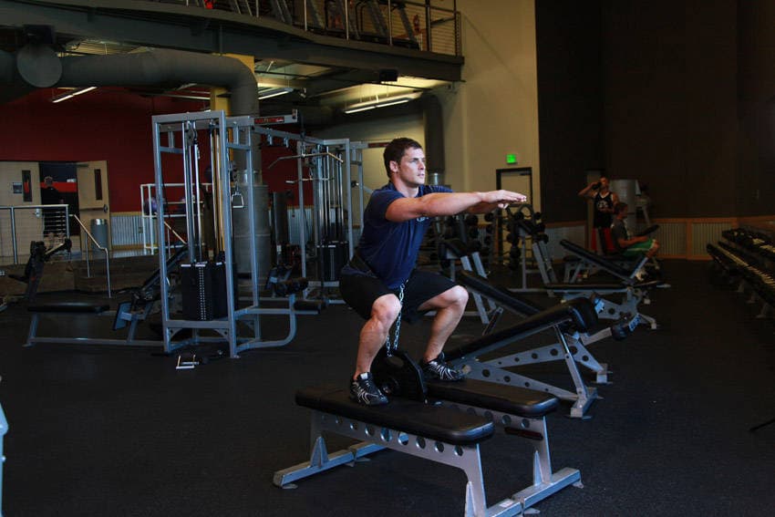 Démonstration de l’exercice : Squat lesté