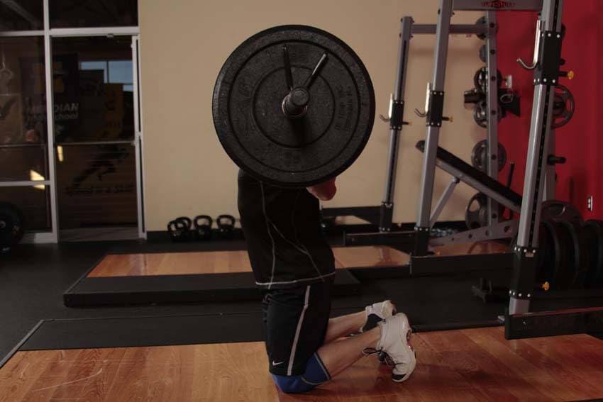 Démonstration de l’exercice : Squat sauté à genoux